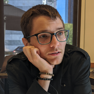 Headshot photo of Eric